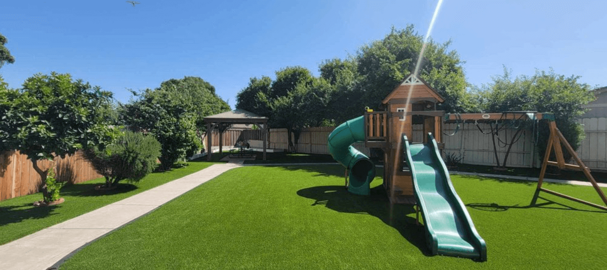 A playground after installation of artificial turf