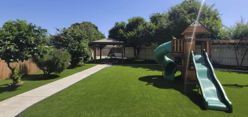A playground after installation of artificial turf